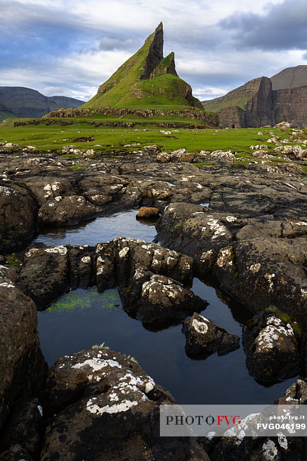 Tindhlmur is an islet on the southside of Srvgsfjrur, west of Vgar in the Faroe Islands, Denmark, Europe